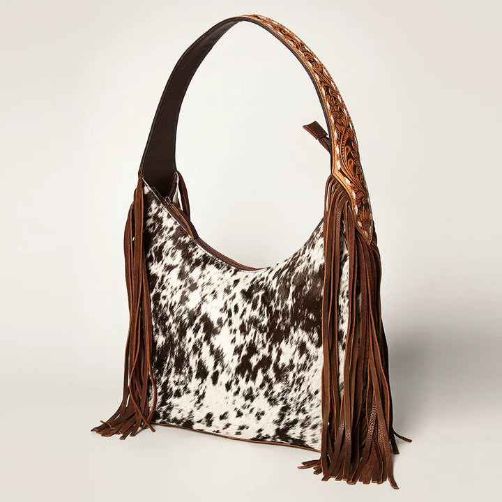 American Darling Handbag ADBGI112B with cowhide pattern and fringe detailing.