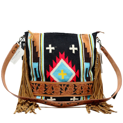American Darling large crossbody messenger bag in hand-tooled vegetable tanned cowhide leather with wool saddle blanket and leather fringes