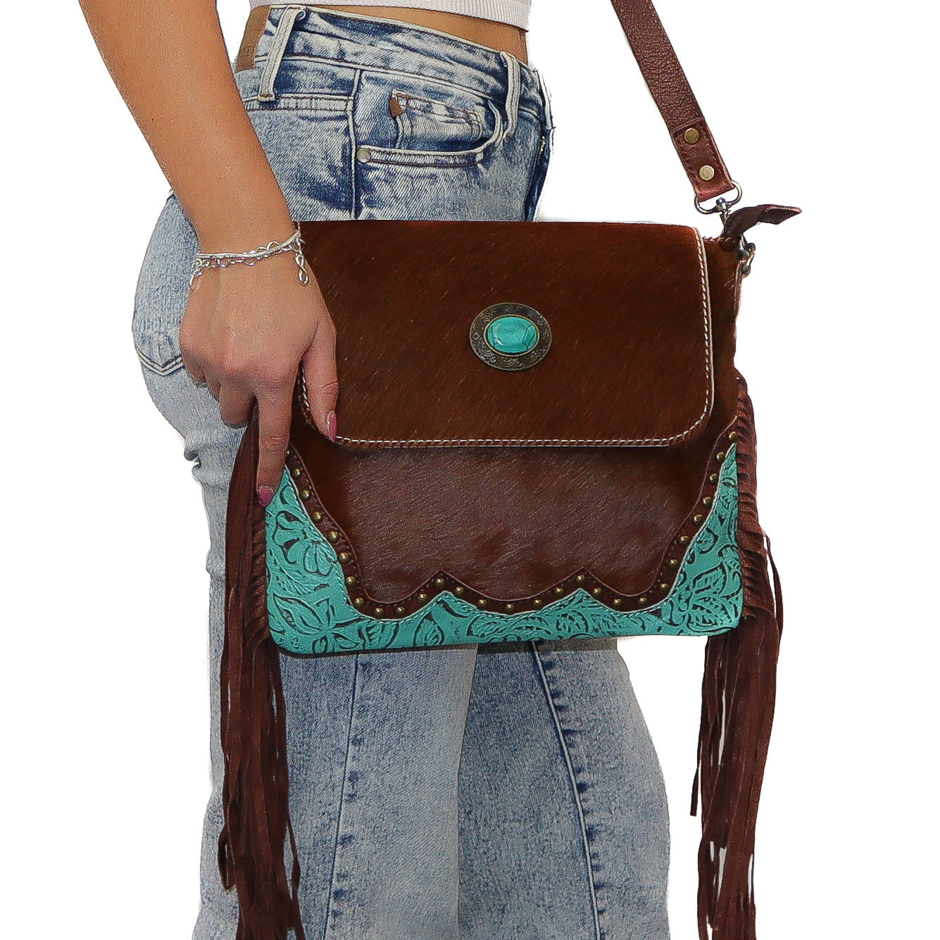 Ohlay Crossbody Bag with floral embossed leather, turquoise stone, leather fringes, and adjustable strap