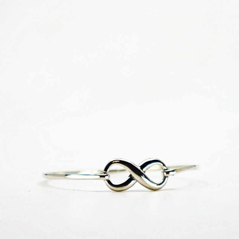 Sterling silver infinity cuff bracelet with minimalist design