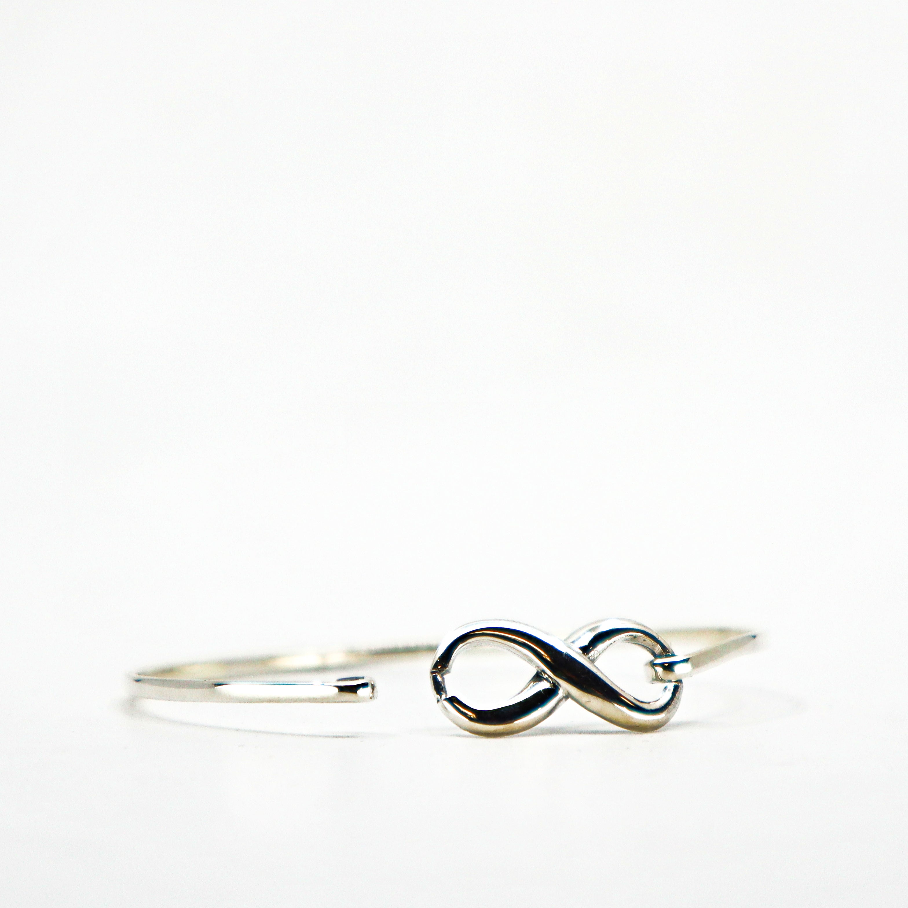 Sterling silver infinity cuff bracelet with minimalist design