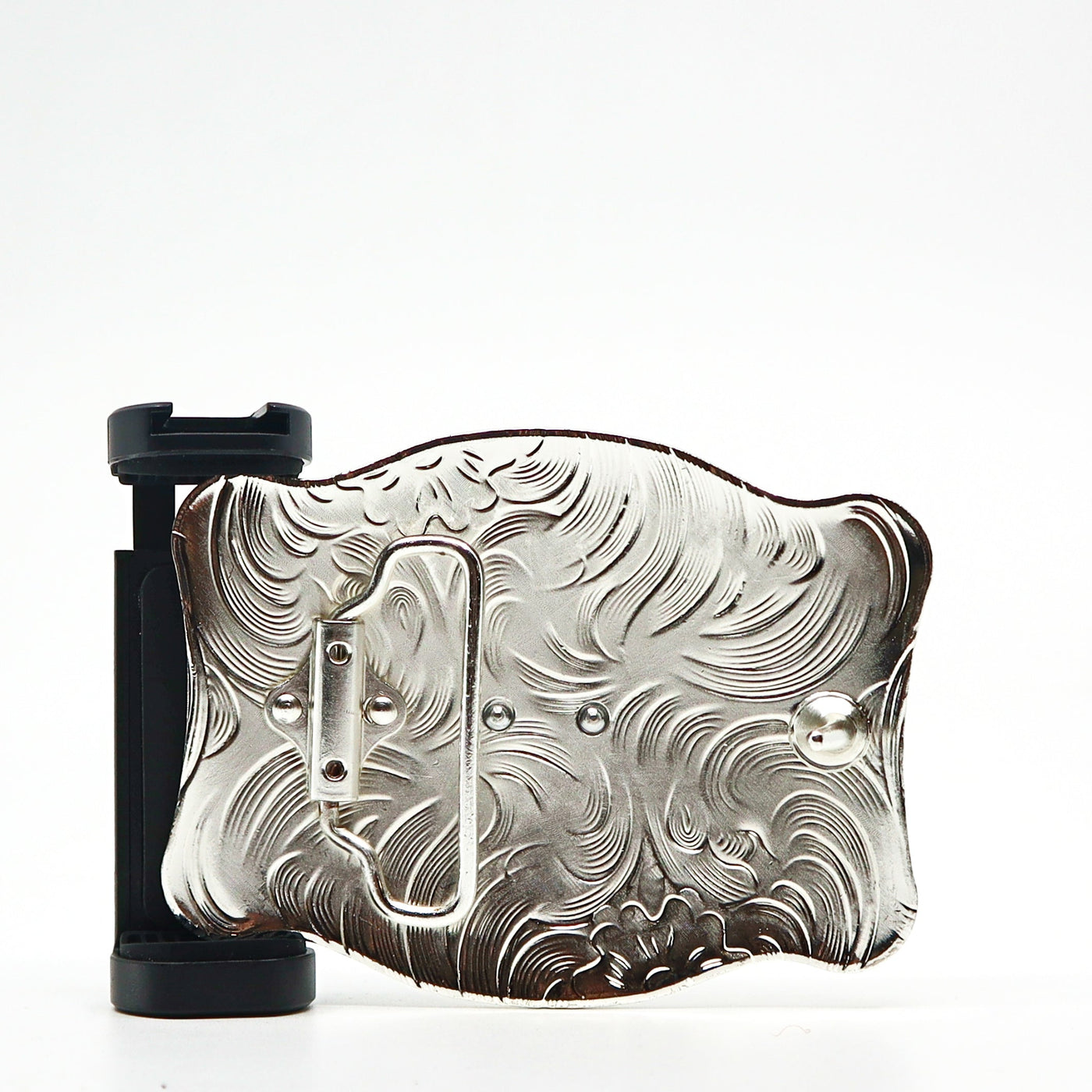 Ornate silver belt buckle PSTPBB00 with intricate swirling patterns and black attachment mechanism