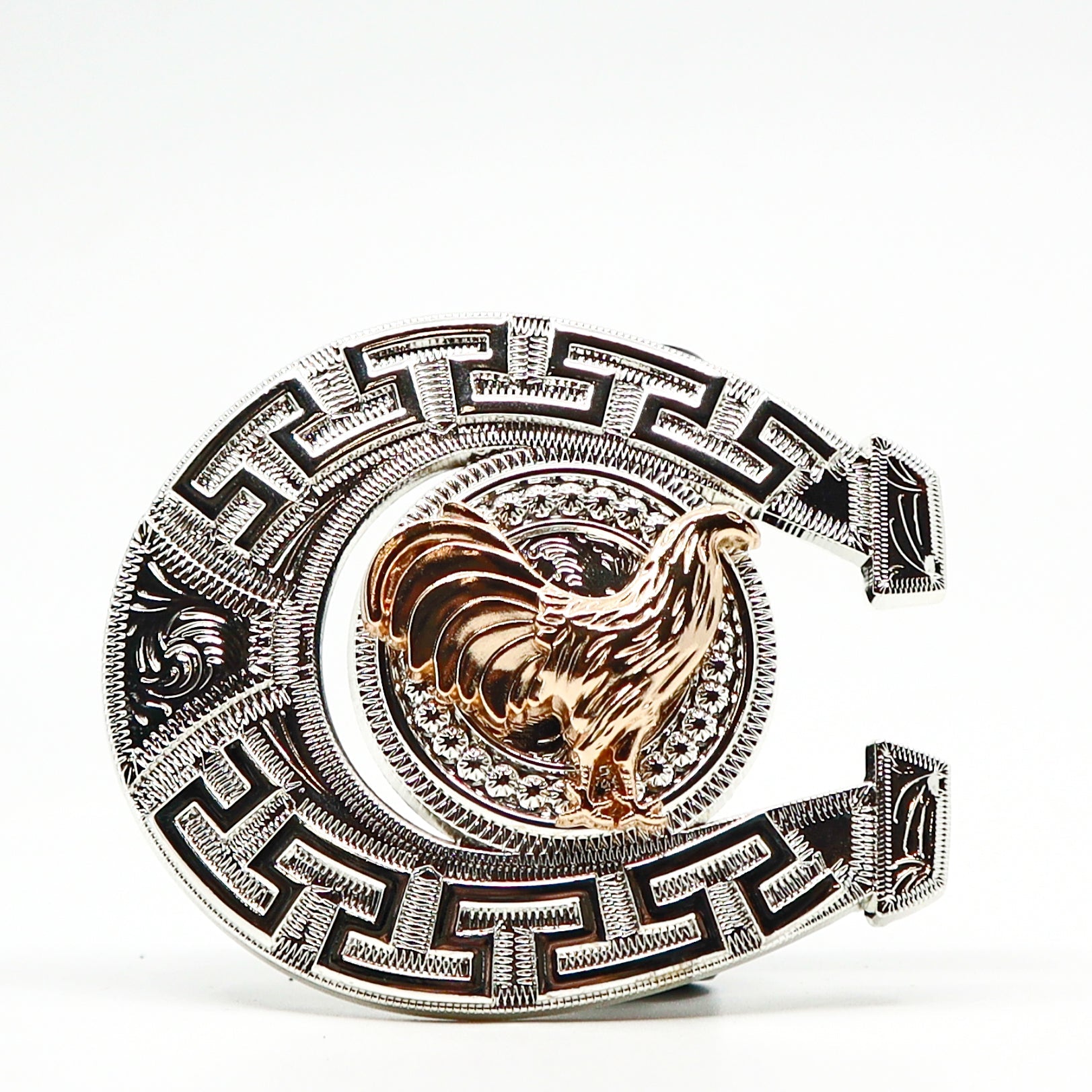 Decorative belt buckle with a gold rooster and intricate black and silver geometric patterns