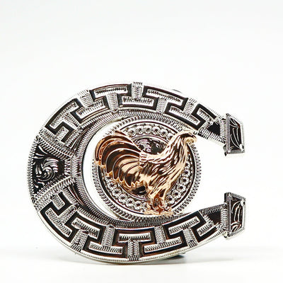 Decorative belt buckle with a gold rooster and intricate black and silver geometric patterns