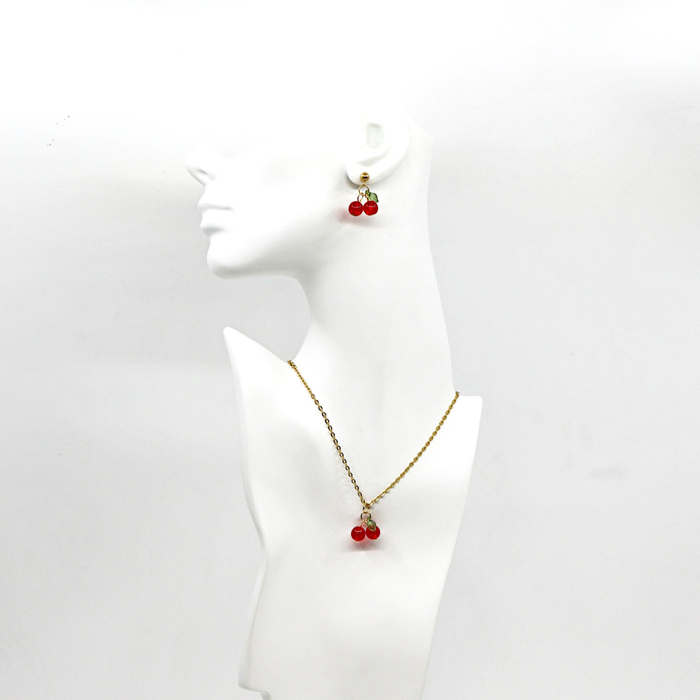 Gold cherry drop earrings and matching necklace set with 18K gold-plated stainless steel and red cherry charms.