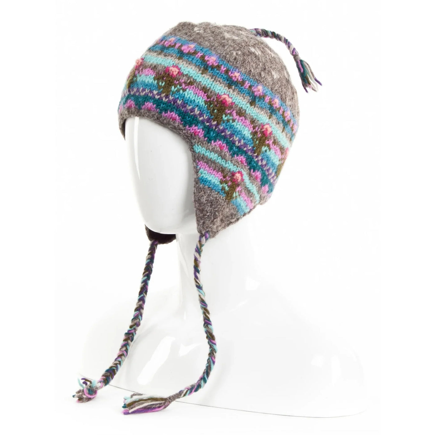 Galena Earflap Hat in soft wool with colorful springtime bloom patterns and braided ties for warmth and comfort.