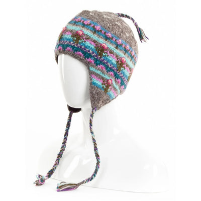Galena Earflap Hat in soft wool with colorful springtime bloom patterns and braided ties for warmth and comfort.