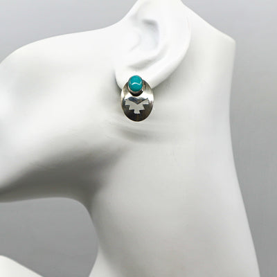 Handmade sterling silver turquoise concho stud earrings PSTPE18 on white background