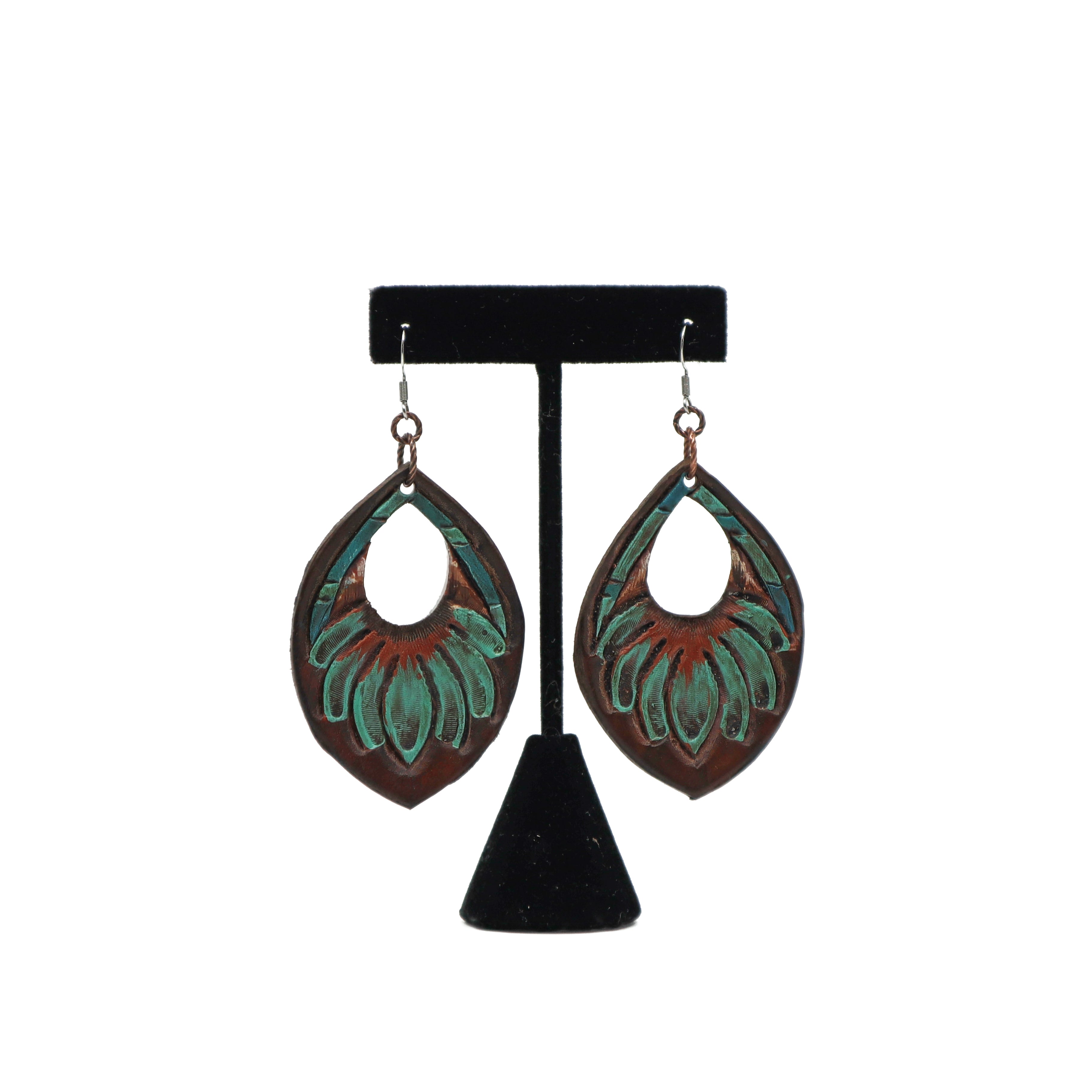 Handmade carved leather dangle earrings with intricate design