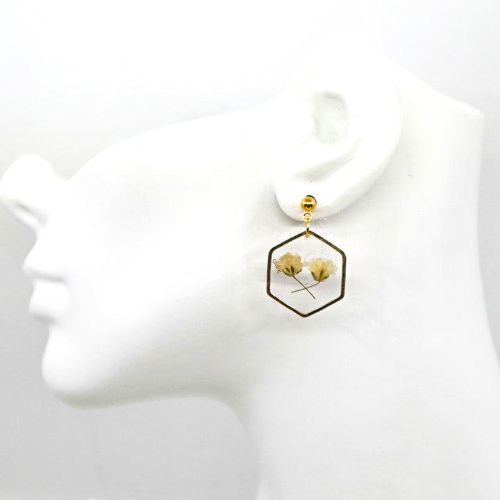 Handmade pressed baby’s breath floral resin earrings with gold hexagonal frames