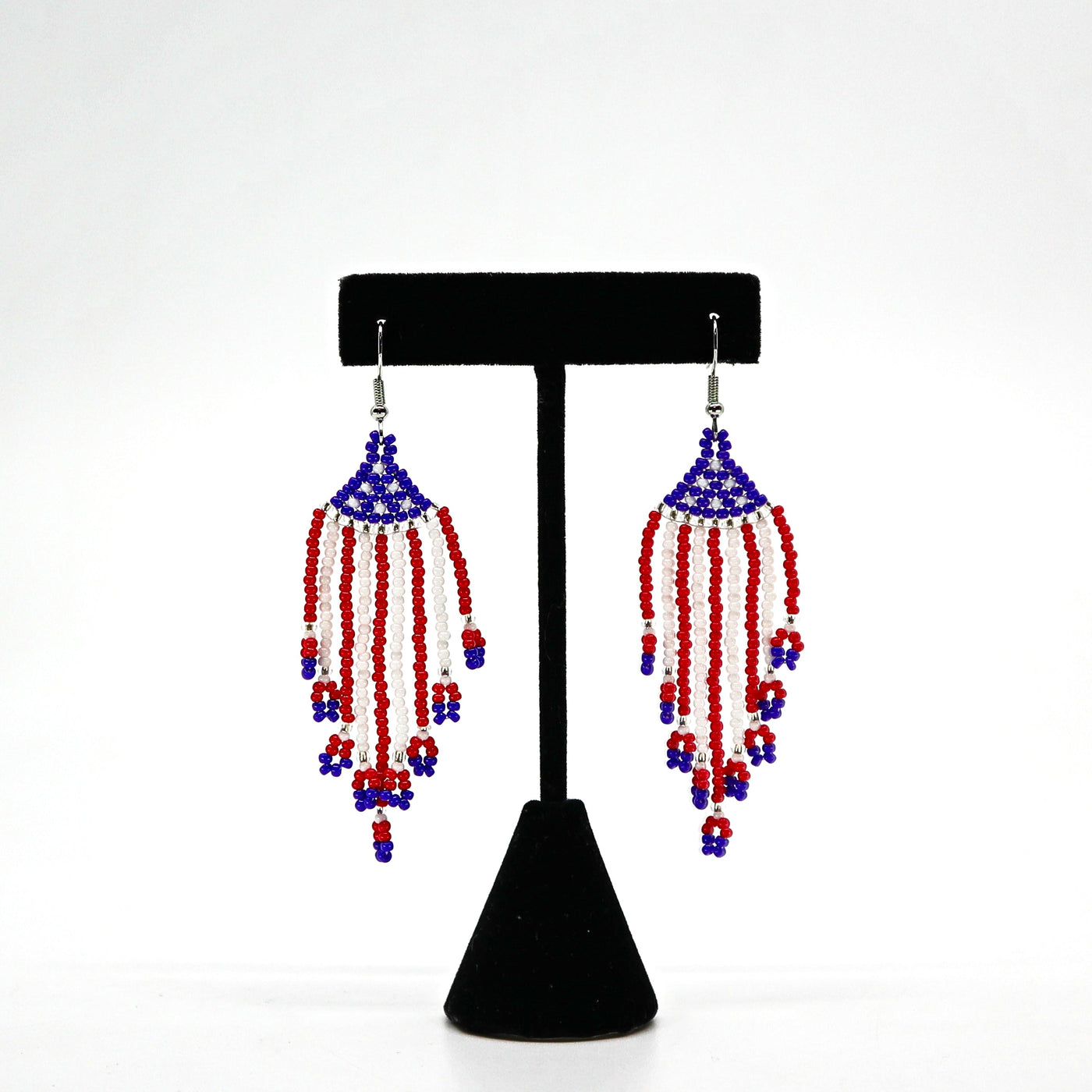 Boho USA flag inspired beaded tassel earrings with red, white, and blue handwoven rice beads and lightweight design.