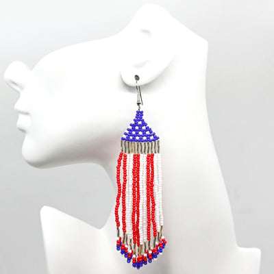 Boho USA flag beaded tassel earrings with handwoven red, white, and blue rice beads and lightweight design