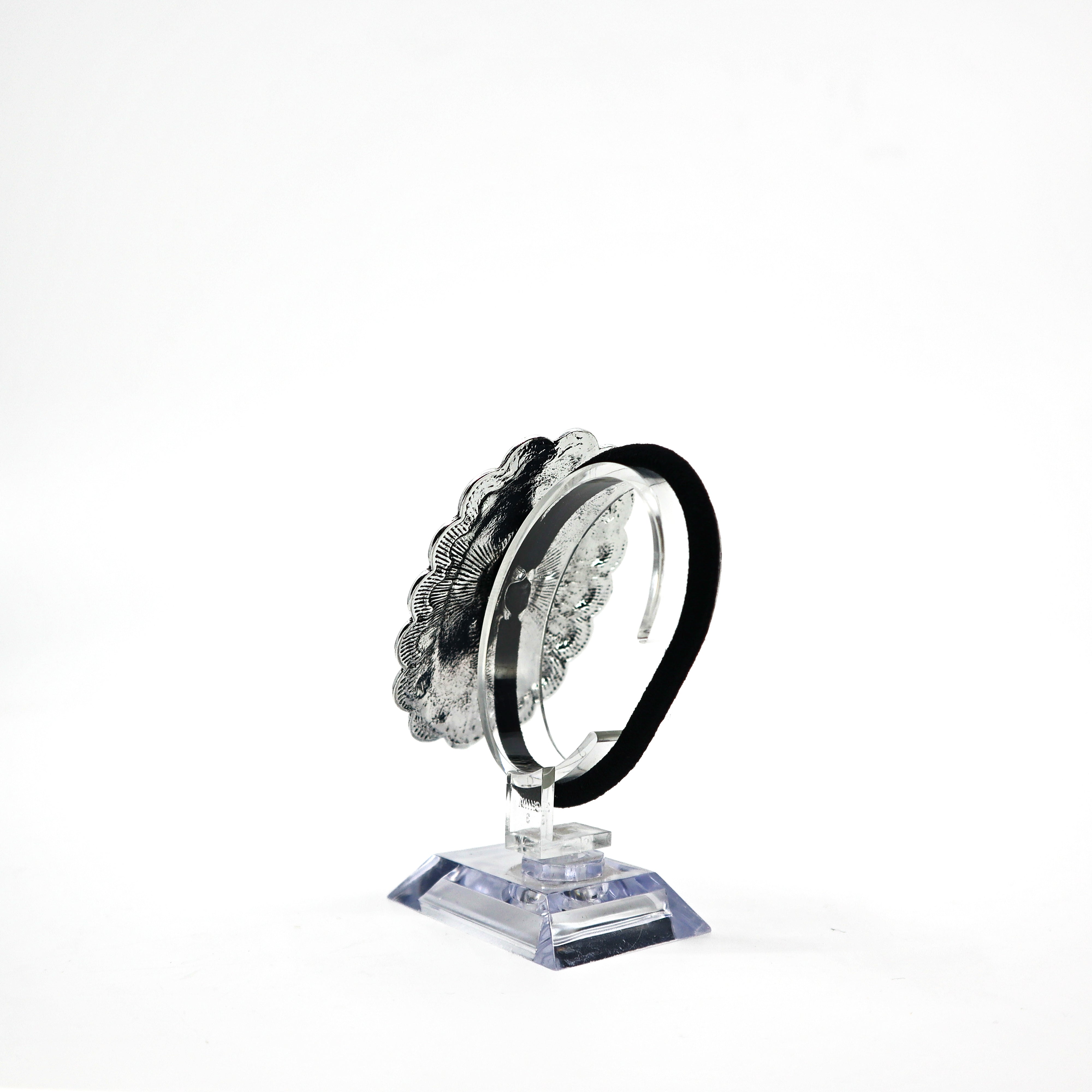Turquoise concho ponytail holder PSTPHC07 with silver detailing on display stand