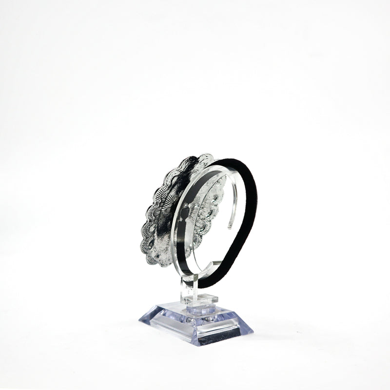 Turquoise concho ponytail holder PSTPHC07 with silver detailing on display stand