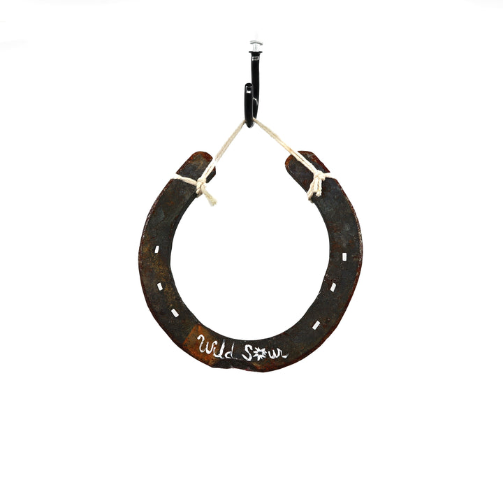 Wild Sour hand painted rustic horseshoe with holiday charm and good luck symbol