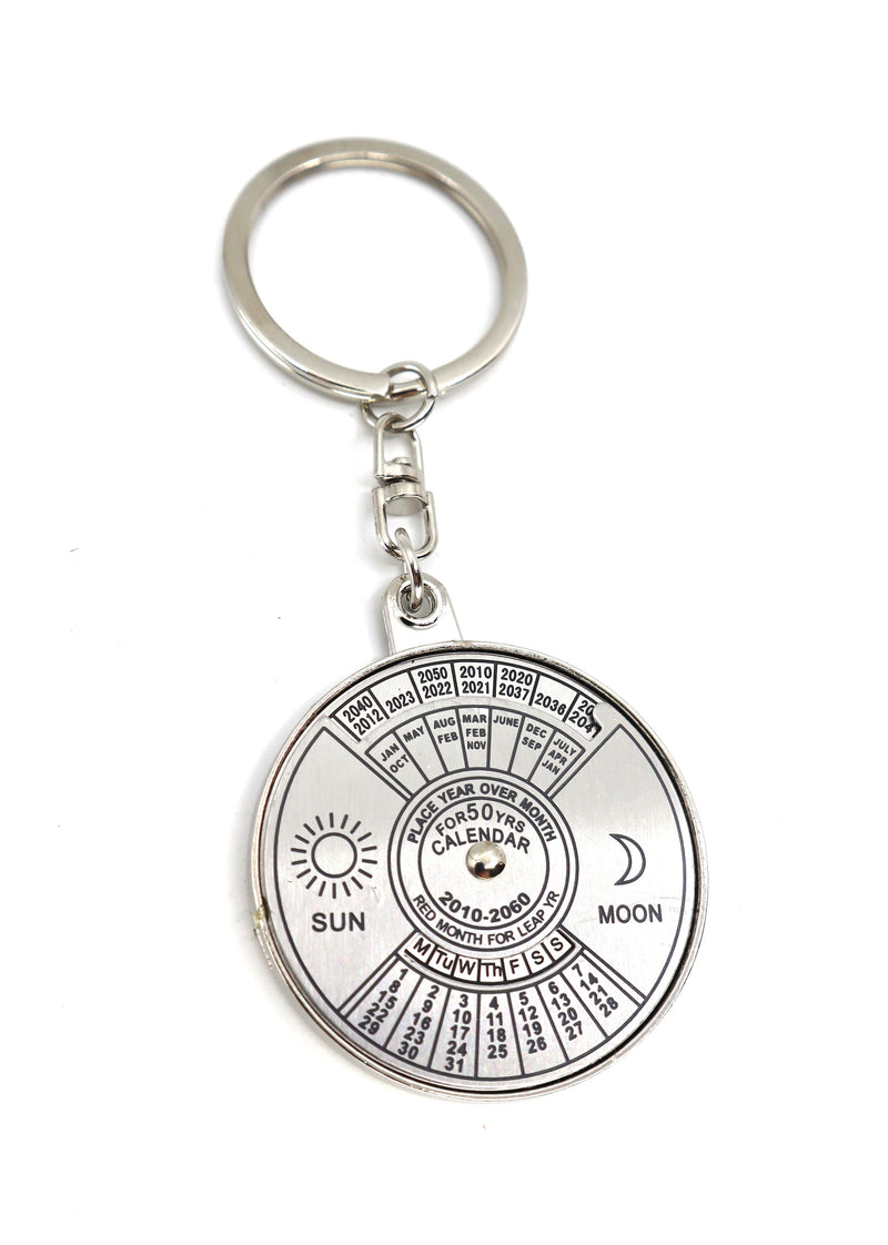 Silver 50 Year Perpetual Calendar keychain with black background and detailed design