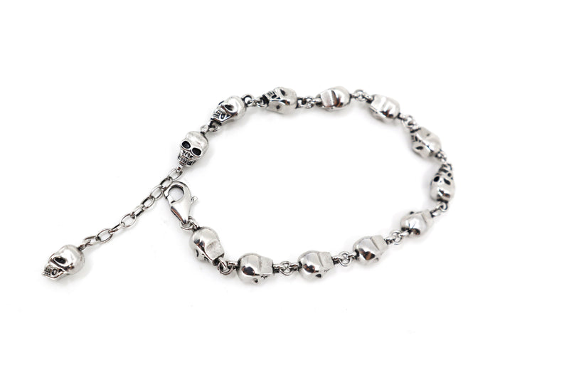 Silver skulls bracelet with lobster clasp, vintage rebel street fashion accessory, unisex durable copper design