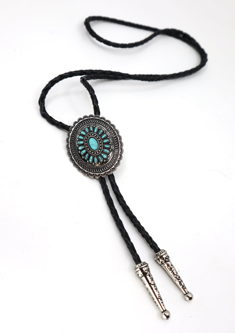 Cowboys carved turquoise flower bolo tie with genuine leather cord and engraved metal tips