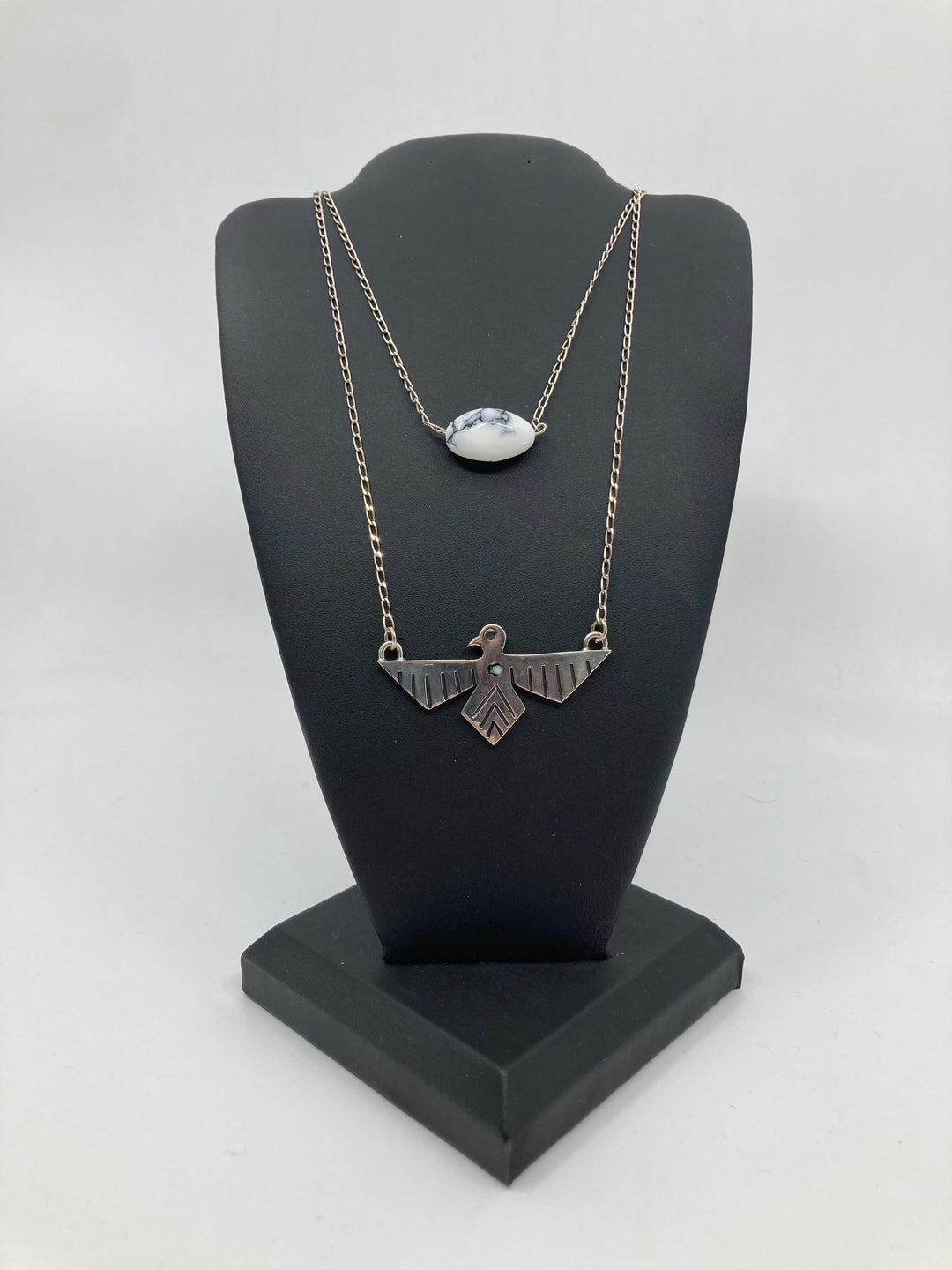 Sterling silver Howlite Thunderbird necklace with versatile stylish design