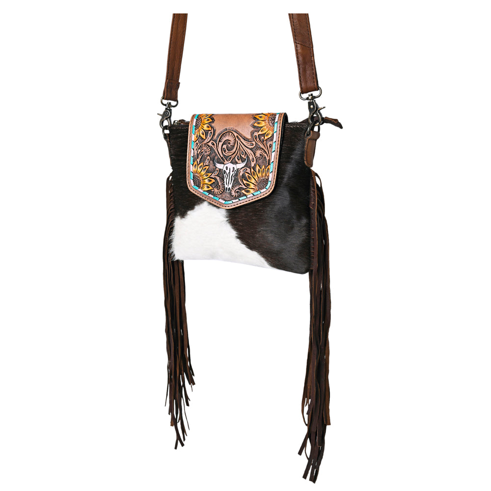 Ohlay Crossbody Bag KBG313 with hand tooled leather, fringes, and adjustable strap.