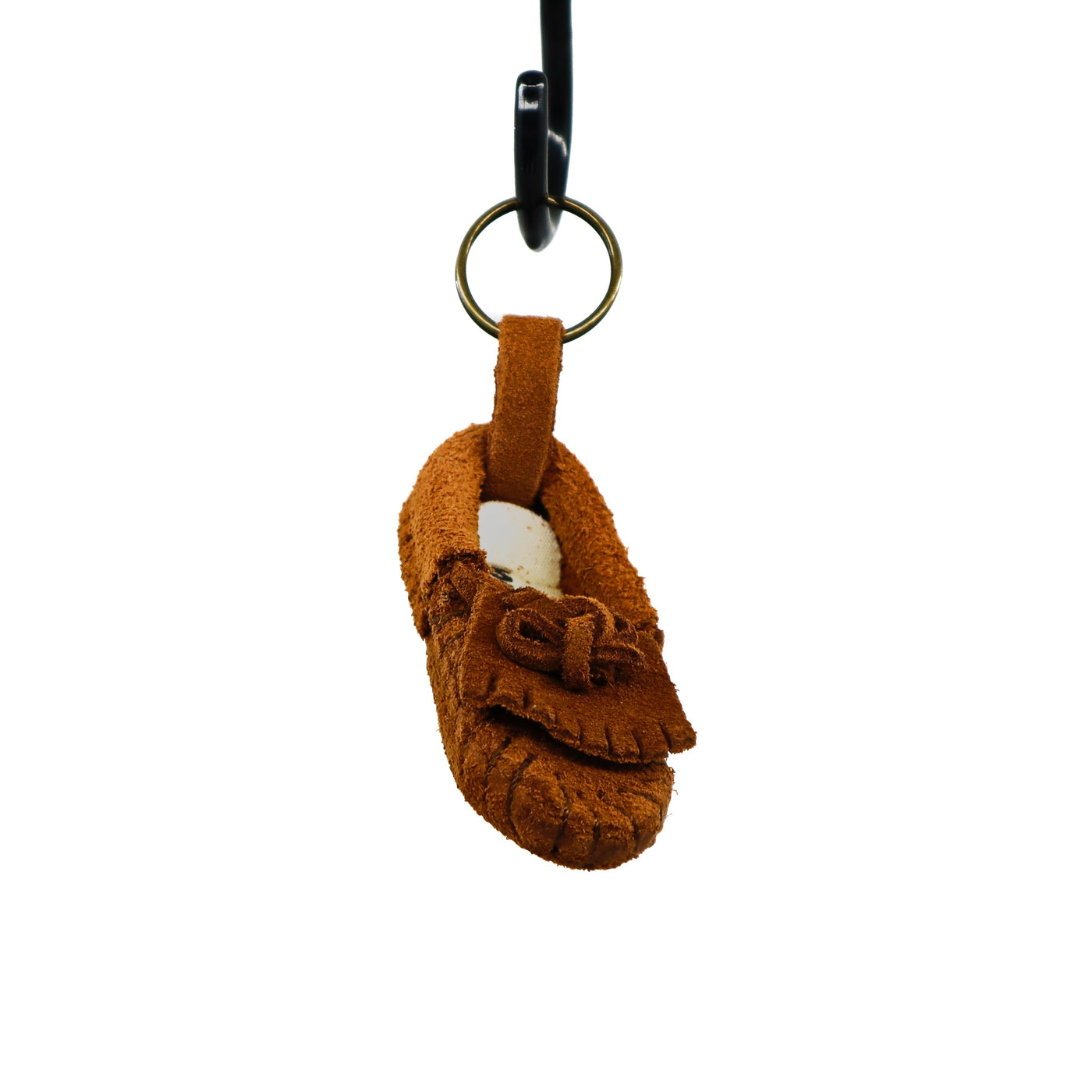 Minnetonka Key Ring featuring a miniature brown suede moccasin hanging on a metal ring.