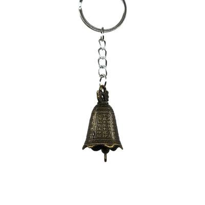 Antique brass bell keychain with vintage wind chime design and intricate patterns