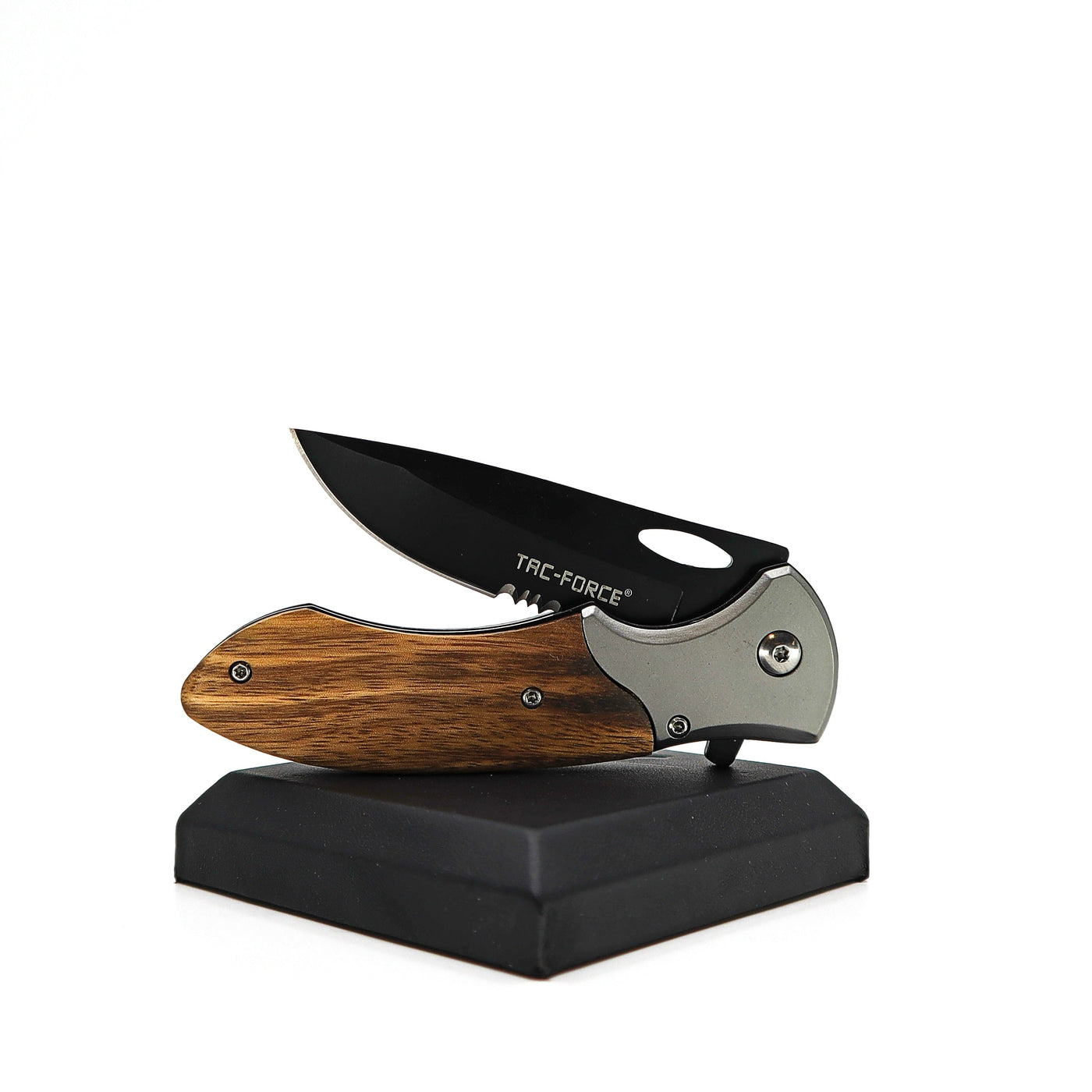 Tac Force Tactical Folding Knife with black stainless steel blade and wooden pakkawood handle displayed on stand