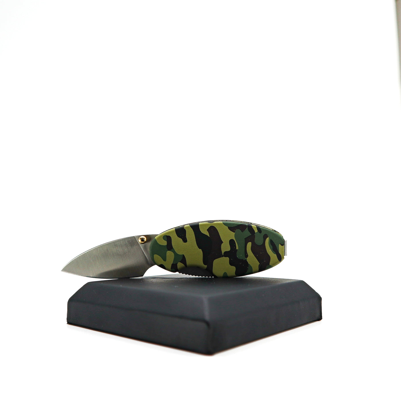 Compact Money Clip Linerlock knife with satin stainless steel blade and camouflage aluminum handle on black display stand