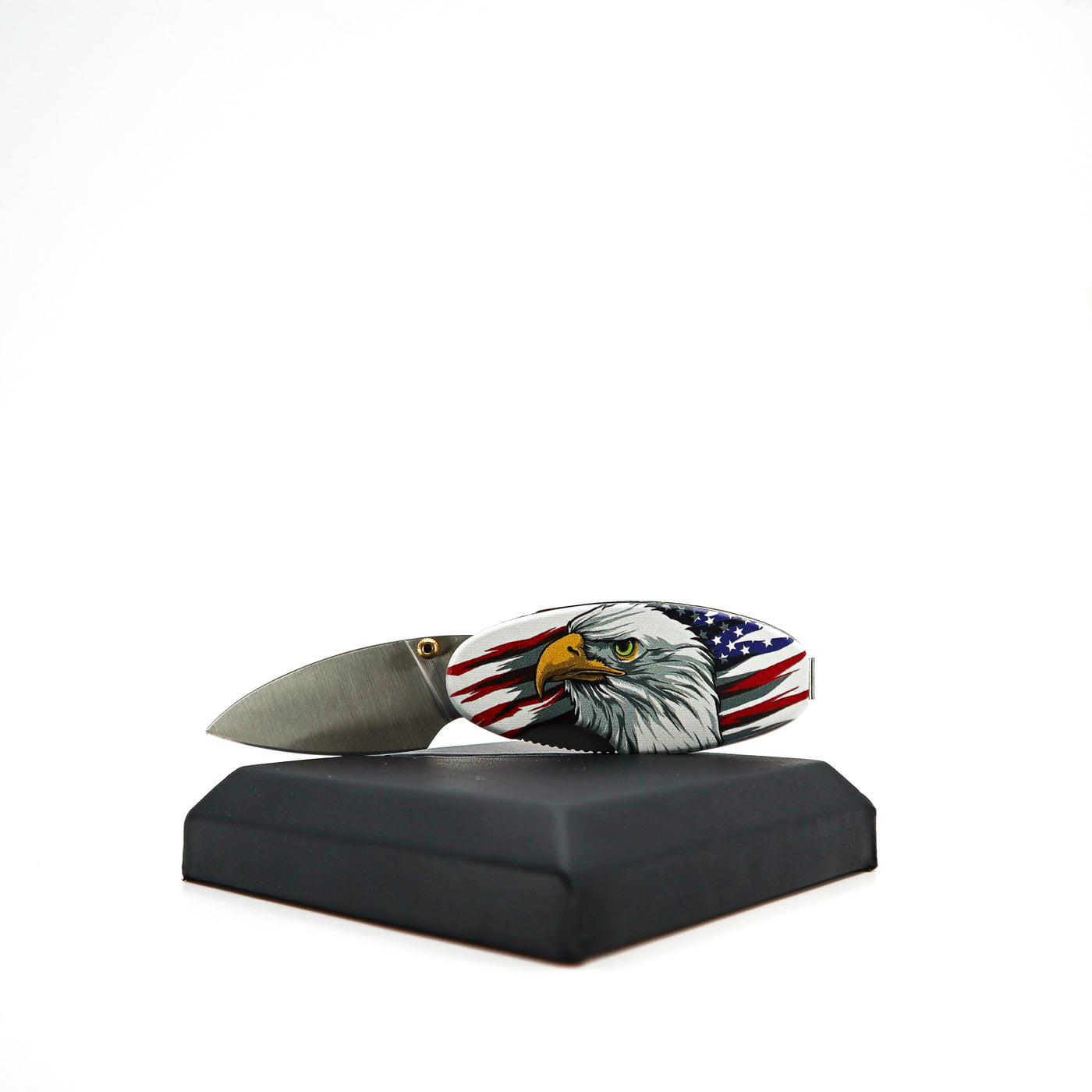 Compact Money Clip Linerlock knife with patriotic eagle design and stainless steel blade on black display stand
