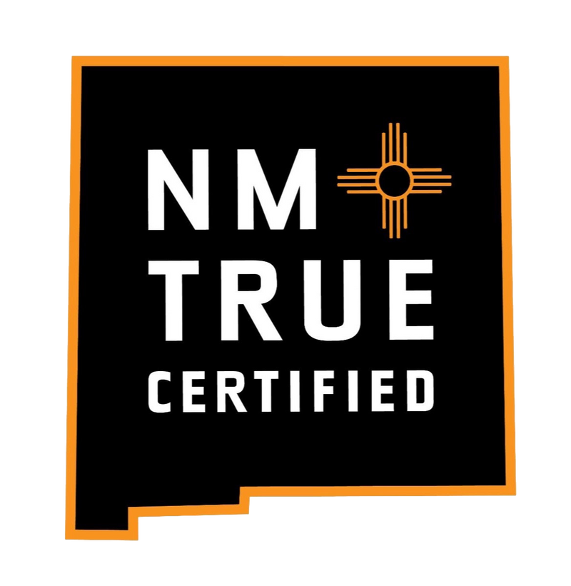 NM True Certified logo in black and orange.
