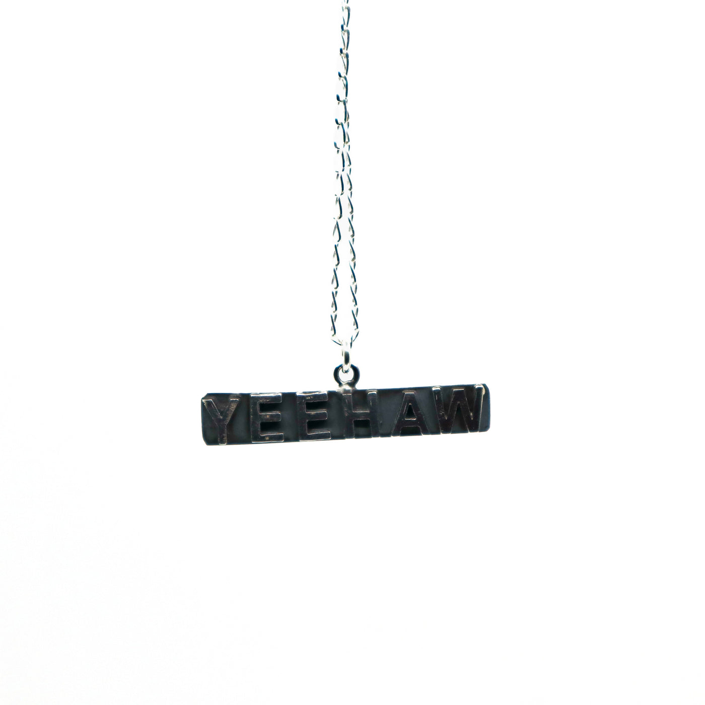 Handmade sterling silver Yeehaw pendant necklace on chain