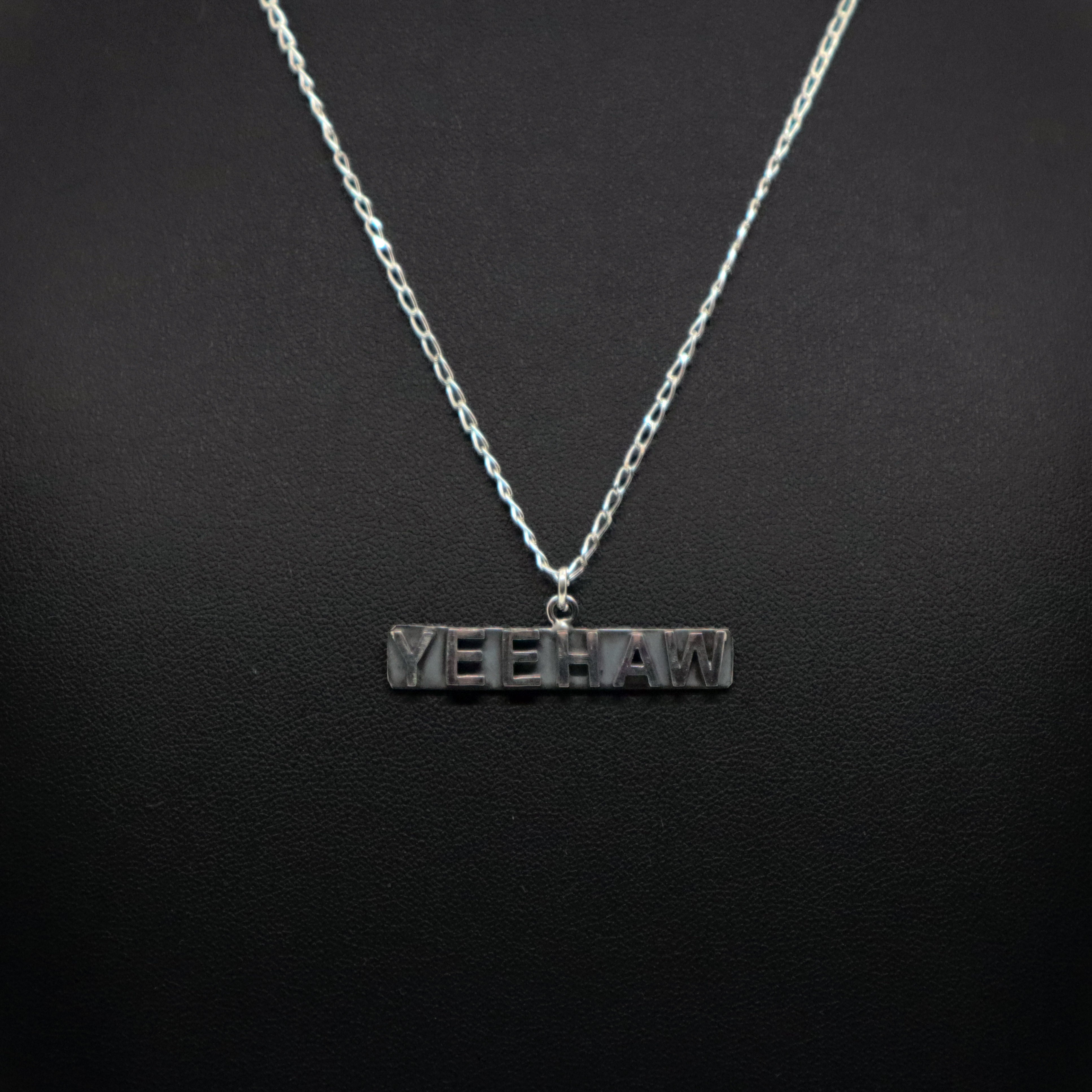 Handmade sterling silver Yeehaw pendant necklace on chain