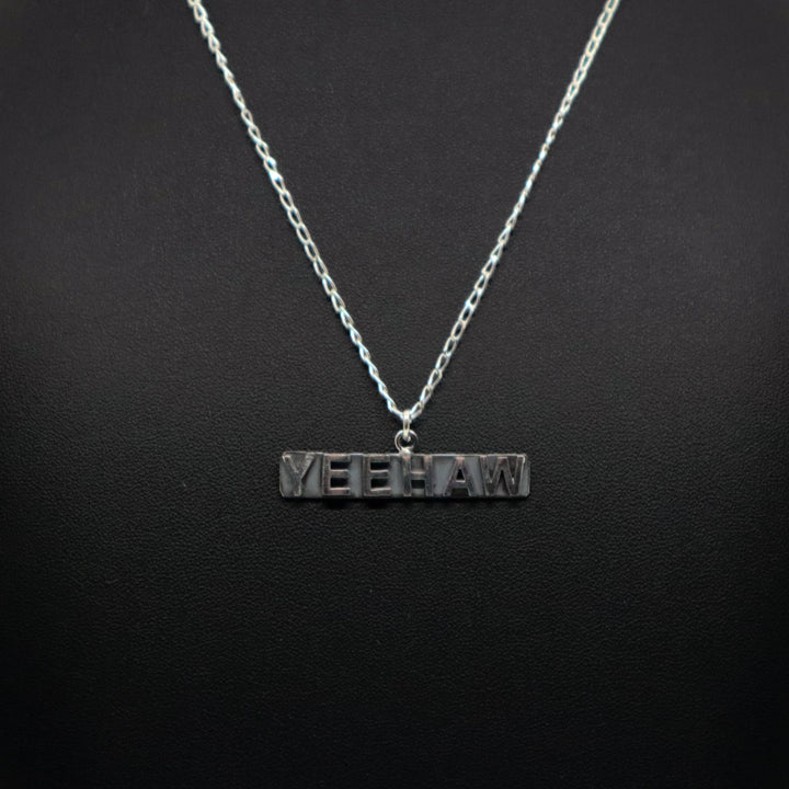 Handmade sterling silver Yeehaw pendant necklace on chain