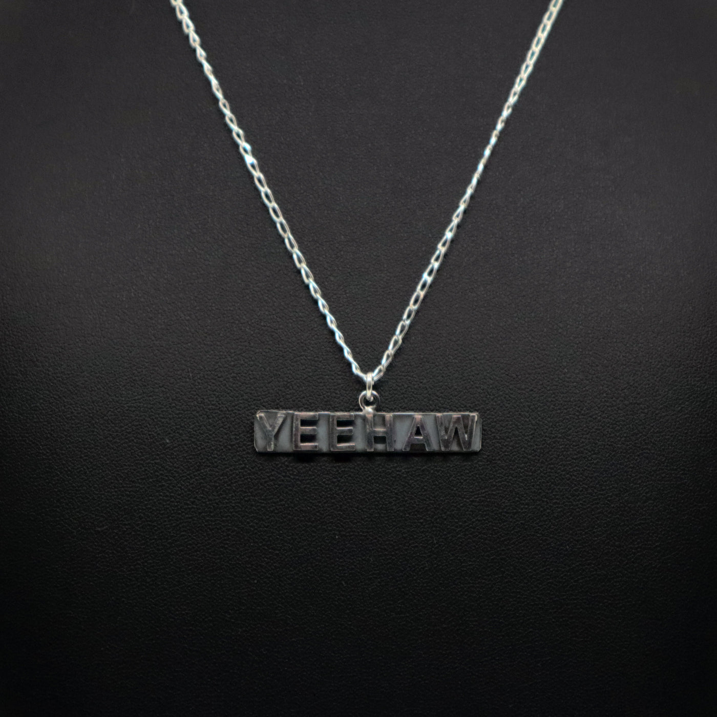 Handmade sterling silver Yeehaw pendant necklace on chain