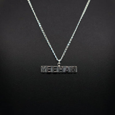 Handmade sterling silver Yeehaw pendant necklace on chain