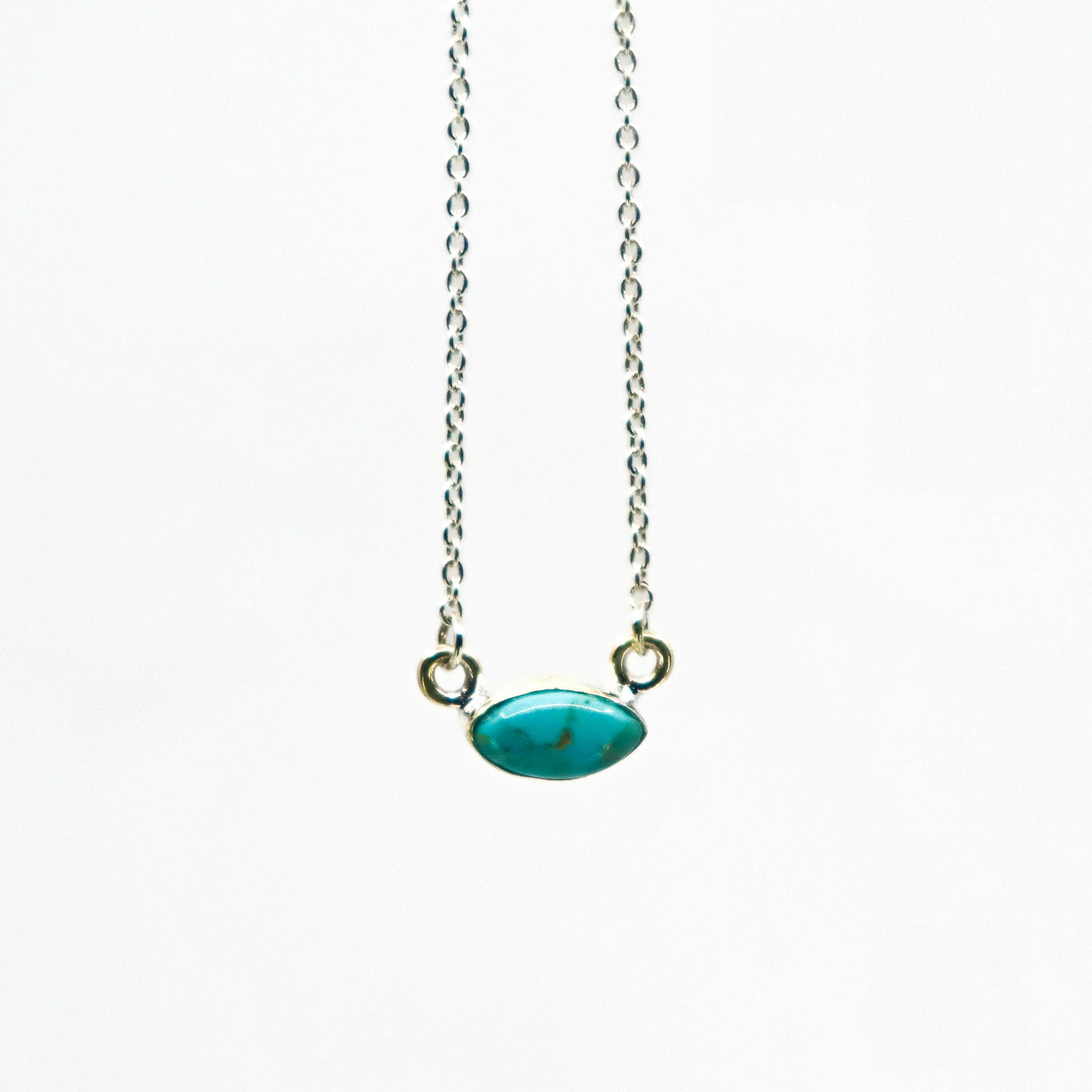 Handmade sterling silver necklace with oval turquoise pendant on delicate chain