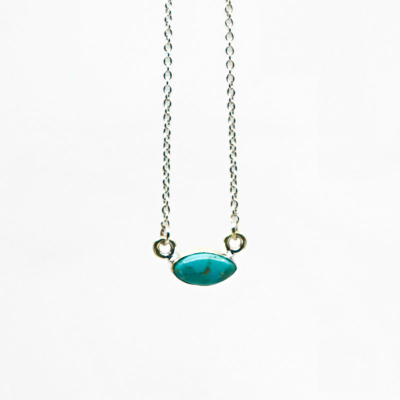 Handmade sterling silver necklace with oval turquoise pendant on delicate chain