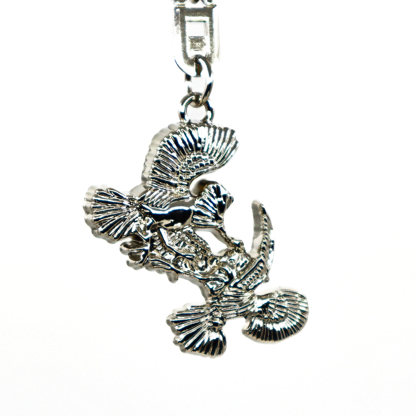 Silver metallic Thunderbird design key ring with intricate feather details and a sturdy clasp.