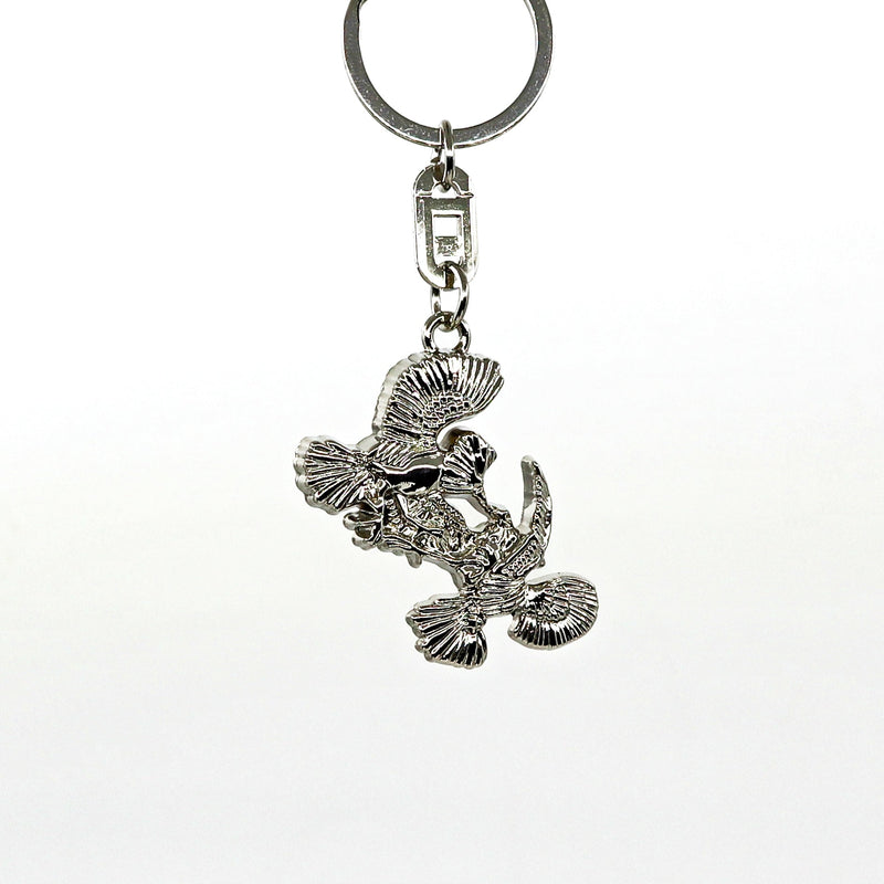 Silver metallic Thunderbirds key ring with detailed bird design hanging from a keychain ring