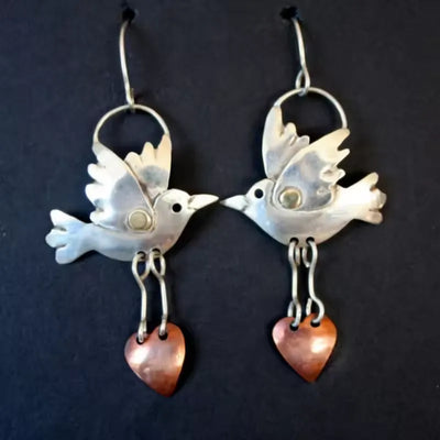 Bird Two-Tone Heart Embellished Earrings with retro design and heart accents.