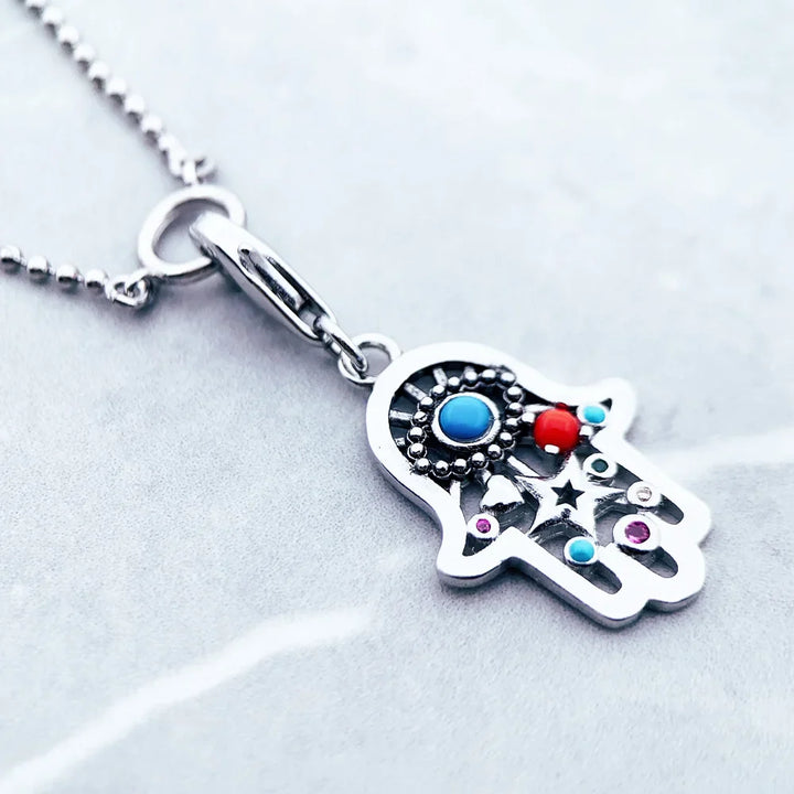 Sterling Silver Charm Necklace with colorful zircon gemstone, symbol of protection and good fortune.