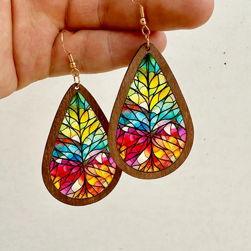Mosaic stained glass teardrop earrings with vibrant kaleidoscope pattern and wooden frame