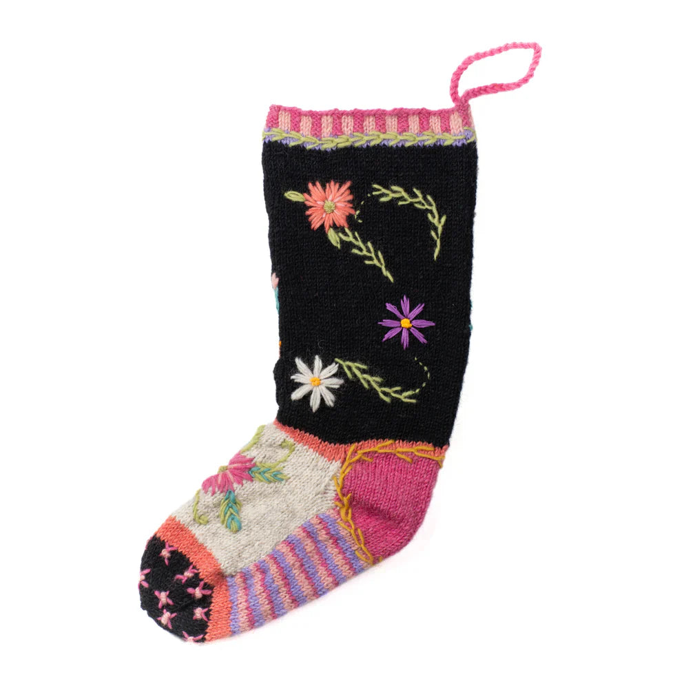 Celeste Christmas Stocking made of 100% wool with colorful floral embroidery and felt angel appliqué, handcrafted holiday decor.