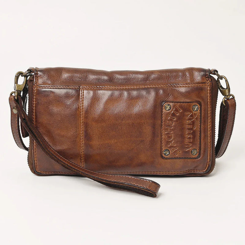 Spaghetti Western Crossbody Wallet in premium brown full grain leather with adjustable strap, antique metal fittings, and decorative rivets.