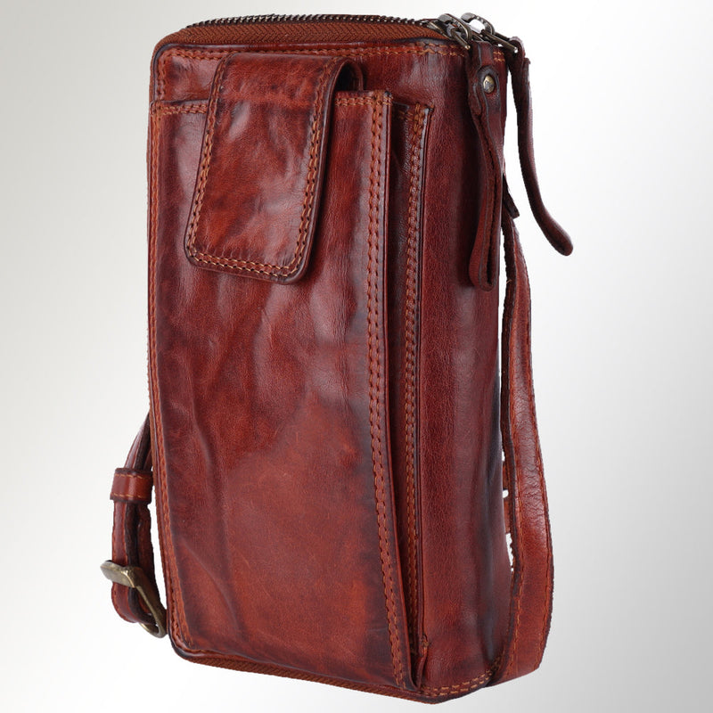 Handcrafted Spaghetti Western Sling bag made of fine leather from Brazil, Argentina, and Italy, assembled in Mexico.