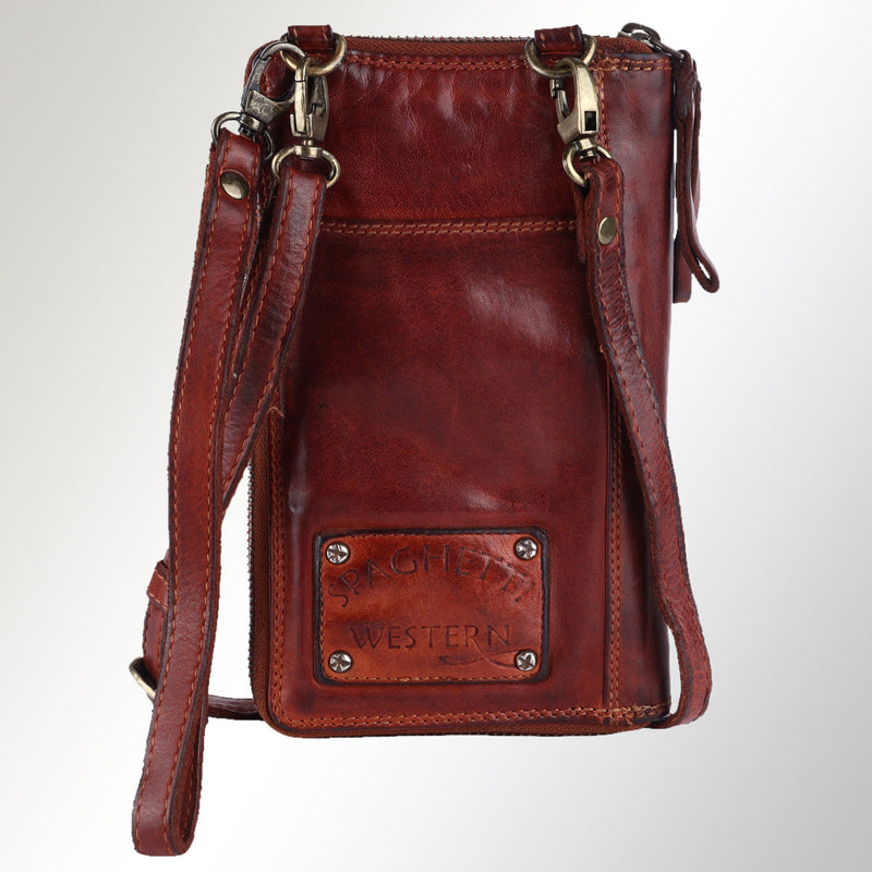 Handmade Spaghetti Western Sling bag in rich brown leather with adjustable straps and embossed logo plate