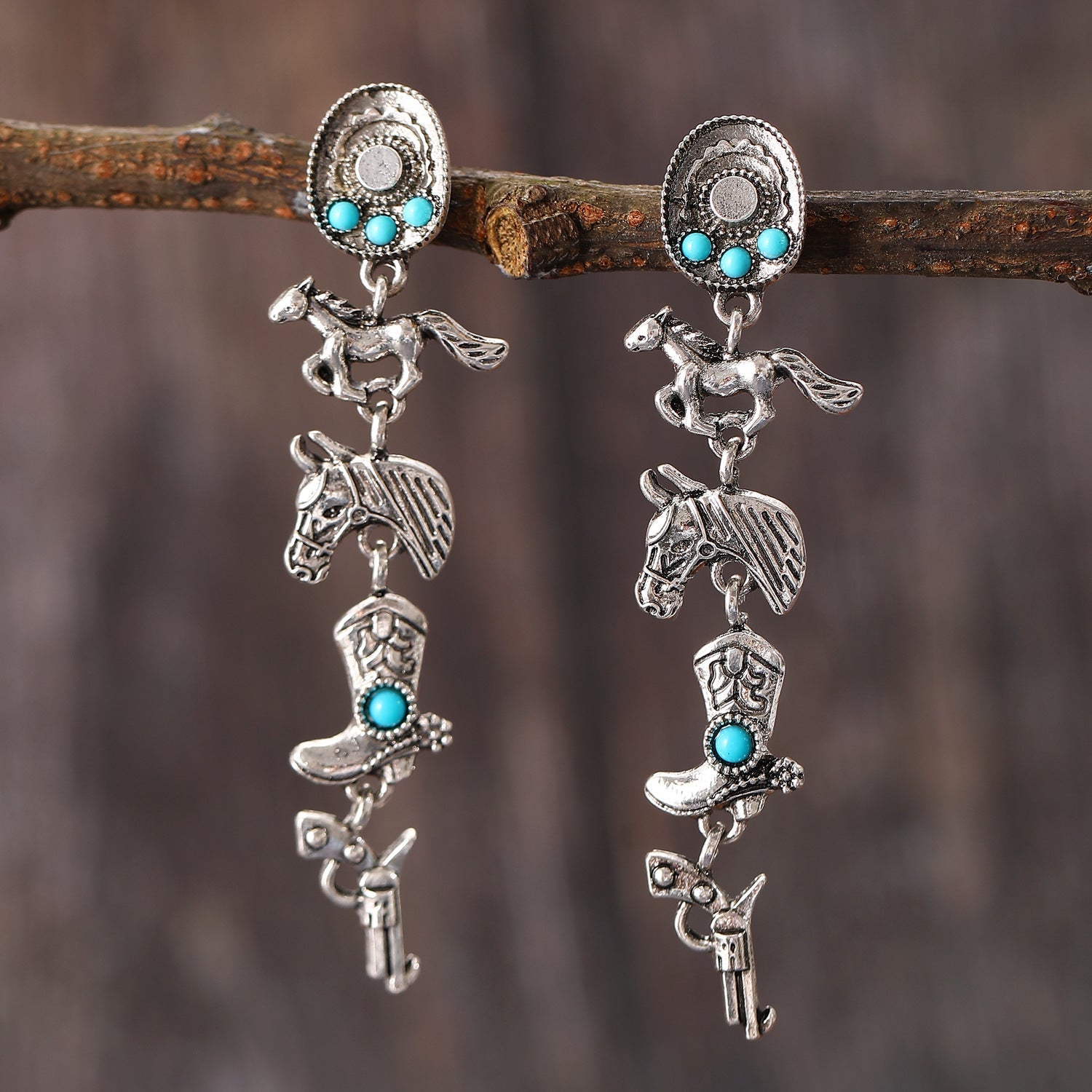 Western Boho Earrings with turquoise stones featuring cowboy hats, horses, boots, and pistols in a vintage bohemian style