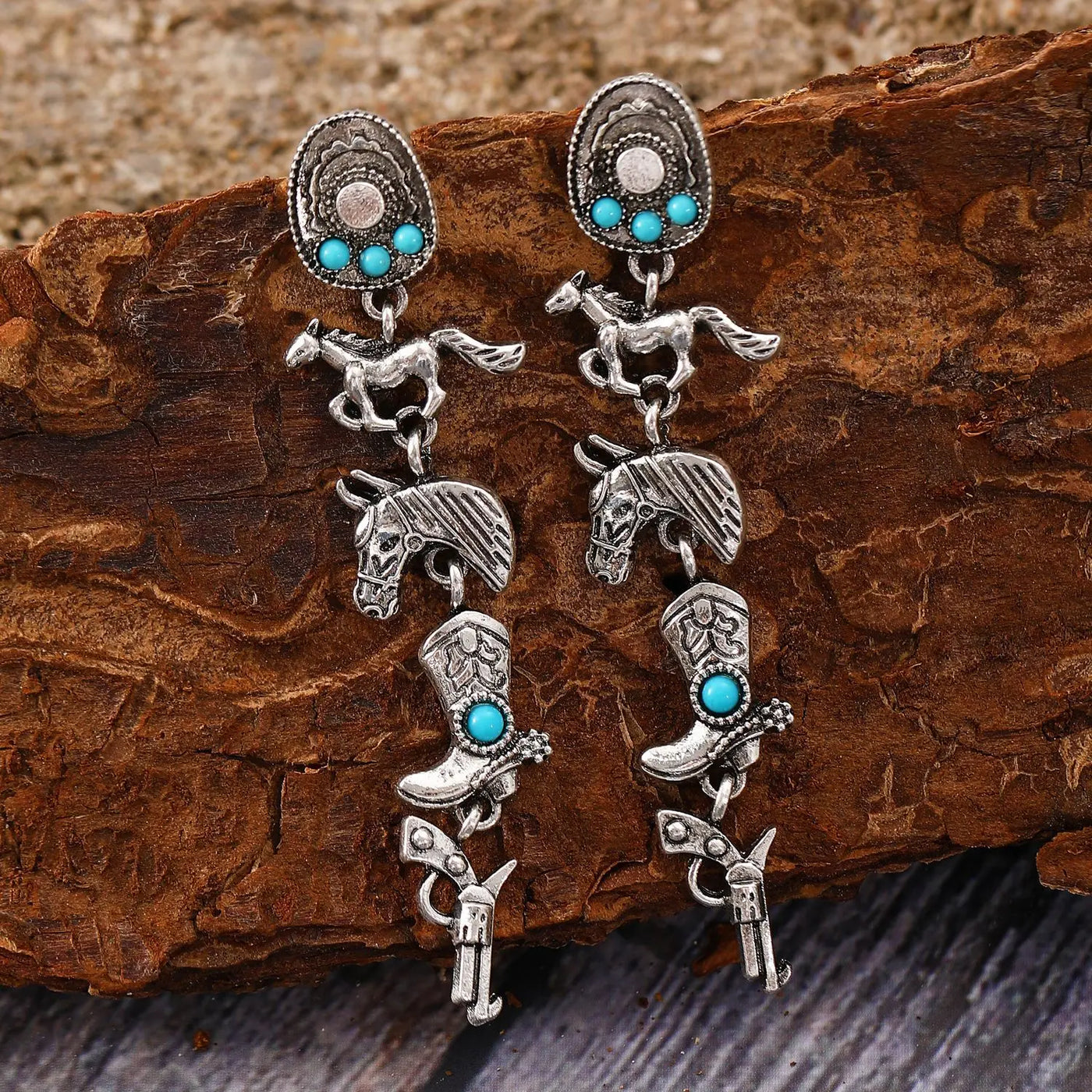 Western Boho Earrings with turquoise stones featuring cowboy hats, horses, boots, and pistols in a vintage bohemian style