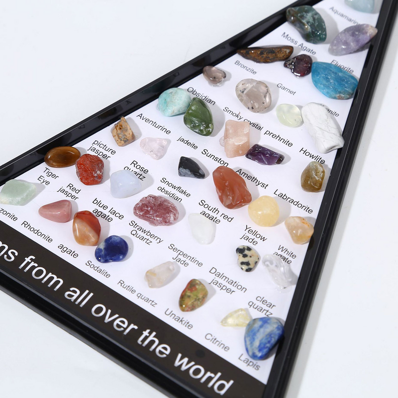 36-piece multicolor healing crystal set with triangular display case for DIY jewelry and chakra balancing.