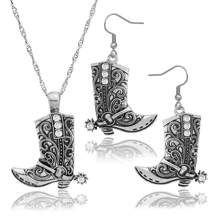 Silver western cowgirl boot pendant necklace and matching earrings set with intricate detailing and spurs.